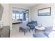Comfortable sitting area connected to main bedroom offering a serene retreat with plush seating at 2040 White Oak Dr, Shelbyville, IN 46176