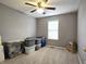 Bedroom featuring carpet, grey walls, and a window at 2303 Eagle Brook Dr, Shelbyville, IN 46176