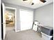 Bedroom featuring carpet and grey walls, plus a closet and other storage at 2303 Eagle Brook Dr, Shelbyville, IN 46176