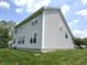 Well-maintained home exterior with ample yard space and attractive siding at 2303 Eagle Brook Dr, Shelbyville, IN 46176