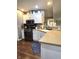 Updated kitchen with stainless steel appliances, ample counter space, and modern fixtures at 2303 Eagle Brook Dr, Shelbyville, IN 46176