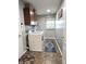 Well-equipped laundry room with modern appliances, ample storage, and natural light at 2303 Eagle Brook Dr, Shelbyville, IN 46176