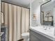 Bathroom showcasing a stylish vanity, mirror, and neutral color scheme at 248 Legends Creek Pl # 207, Indianapolis, IN 46229