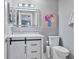 Stylish bathroom with a modern vanity, decorative mirror, and a neutral color scheme for a spa-like feel at 248 Legends Creek Pl # 207, Indianapolis, IN 46229