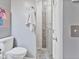 Bathroom featuring a walk-in shower with modern tile design and sleek fixtures, creating a spa-like experience at 248 Legends Creek Pl # 207, Indianapolis, IN 46229