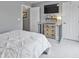 Comfortable bedroom with desk, tv and neutral colors, ideal for relaxation and work at 248 Legends Creek Pl # 207, Indianapolis, IN 46229