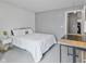 Cozy bedroom featuring a queen bed, modern decor, and minimalist design at 248 Legends Creek Pl # 207, Indianapolis, IN 46229