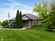 Attractive clubhouse exterior with landscaping and architectural details at 248 Legends Creek Pl # 207, Indianapolis, IN 46229