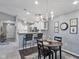 Open floor plan with a dining area, kitchen, and entryway at 248 Legends Creek Pl # 207, Indianapolis, IN 46229