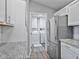 White laundry machines are visible from the kitchen in this bright room at 248 Legends Creek Pl # 207, Indianapolis, IN 46229
