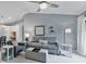 Bright living room with comfortable seating and an open layout to the dining area at 248 Legends Creek Pl # 207, Indianapolis, IN 46229
