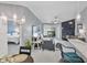 Cozy living room with balcony access adjacent to the primary bedroom at 248 Legends Creek Pl # 207, Indianapolis, IN 46229