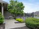 Community pool area featuring a picnic table and landscaping at 248 Legends Creek Pl # 207, Indianapolis, IN 46229