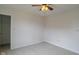 Bedroom with neutral walls, neutral carpet, ceiling fan, and walk-in closet at 2485 Bristol Dr, Franklin, IN 46131