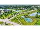 Community aerial view featuring ponds, landscaping, and streets that show the peaceful residential lifestyle at 2789 W High Grove Cir, Zionsville, IN 46077