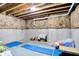 Unfinished basement with exposed ceiling, ready for customization and featuring ample storage space at 2789 W High Grove Cir, Zionsville, IN 46077