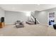 Finished basement featuring neutral walls and plush carpeting and comfortable seating arrangements at 2789 W High Grove Cir, Zionsville, IN 46077