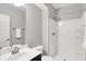 Clean bathroom featuring a shower, vanity, mirror, and modern fixtures, providing a fresh and inviting space at 2789 W High Grove Cir, Zionsville, IN 46077