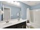 Bright bathroom with double vanity, offering ample space with a shower and bath combination at 2789 W High Grove Cir, Zionsville, IN 46077
