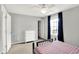 Bright bedroom featuring natural light with a window view, neutral walls, and carpeted floors at 2789 W High Grove Cir, Zionsville, IN 46077