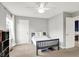 This carpeted bedroom offers neutral walls with natural light, closet space, and door to hall at 2789 W High Grove Cir, Zionsville, IN 46077