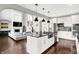 Modern kitchen with granite countertops, stainless steel appliances, and a kitchen island with seating at 2789 W High Grove Cir, Zionsville, IN 46077