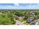 Aerial view of the home in a neighborhood filled with lush trees at 2831 N Talbott St, Indianapolis, IN 46205