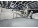 Unfinished basement featuring exposed pipes and mechanical systems at 2831 N Talbott St, Indianapolis, IN 46205