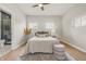 Cozy bedroom with ceiling fan and a modern rug and decor at 2831 N Talbott St, Indianapolis, IN 46205