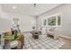 Bright living room with large bay window, fireplace, and a stylish decor rug at 2831 N Talbott St, Indianapolis, IN 46205