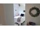 Bright bedroom featuring a white metal frame bed, plush pillows, and modern decor at 3039 28Th St, Columbus, IN 47203