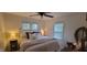 Bedroom with a comfortable bed, soft lighting, and windows offering natural light at 3039 28Th St, Columbus, IN 47203