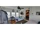 Cozy bedroom with white walls, vintage decor, and a ceiling fan for added comfort at 3039 28Th St, Columbus, IN 47203