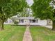 Charming one-story home with a well-maintained front yard and walkway leading to the front door at 308 Mohawk St, Anderson, IN 46012