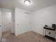 Cozy bedroom featuring a closet and a workspace with a desk for study or work at 3303 Wedgewood Dr, Indianapolis, IN 46227