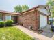 Brick exterior with neutral siding complemented by a well-maintained yard and inviting front entrance at 3303 Wedgewood Dr, Indianapolis, IN 46227