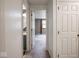 Bright hallway with doors leading to a bathroom and bedroom, enhancing the home's layout at 3303 Wedgewood Dr, Indianapolis, IN 46227