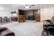 Inviting living room featuring a fireplace, wood paneling, and a comfortable leather couch at 3303 Wedgewood Dr, Indianapolis, IN 46227