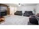 Bright living room with comfortable couches and a decorative rug at 3303 Wedgewood Dr, Indianapolis, IN 46227
