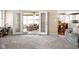 Spacious living area with French doors open to another room and an additional view of the eat-in kitchen at 3304 Fox Orchard Cir, Indianapolis, IN 46214