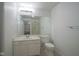 Bright bathroom with white vanity, toilet, and shower with glass door at 350 N Meridian St # 505, Indianapolis, IN 46204