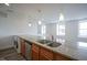 Spacious kitchen with a breakfast bar and stainless steel dishwasher at 350 N Meridian St # 505, Indianapolis, IN 46204