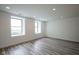 Bright living room with modern flooring and ample natural light at 350 N Meridian St # 505, Indianapolis, IN 46204
