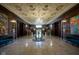 Luxurious lobby showcasing a grand chandelier, marble floors, and classic architectural details at 350 N Meridian St # 505, Indianapolis, IN 46204