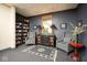 Cozy reading area featuring comfortable armchairs and a bookshelf at 350 N Meridian St # 505, Indianapolis, IN 46204