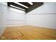 Well-lit squash court with wooden floors and marked boundaries at 350 N Meridian St # 505, Indianapolis, IN 46204