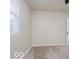 Bright bedroom with carpet flooring and natural light from a large window at 3558 N Gladstone Ave, Indianapolis, IN 46218
