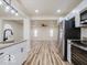 Bright, well-equipped kitchen with stainless steel appliances, modern fixtures, and an open layout at 3558 N Gladstone Ave, Indianapolis, IN 46218