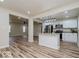 Open kitchen featuring an island, stainless steel appliances, and lots of natural light at 3558 N Gladstone Ave, Indianapolis, IN 46218