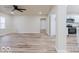 Spacious living room with lots of natural light, modern flooring, and an open concept to the kitchen at 3558 N Gladstone Ave, Indianapolis, IN 46218